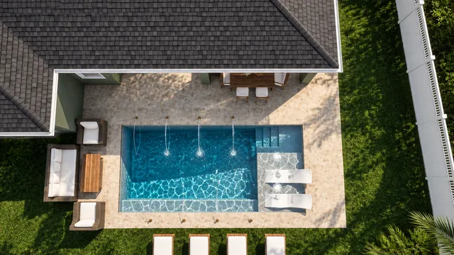 Render of the Payne pool and sunshelf, view 03 (day aerial)